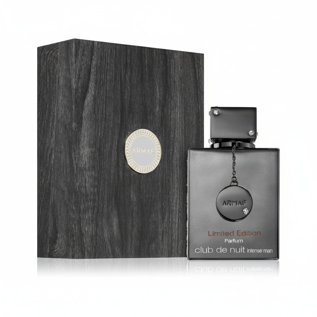 A boxed ARMAF Club de Nuit Limited Edition perfume bottle with a black cap and label, indicating luxury and exclusivity.