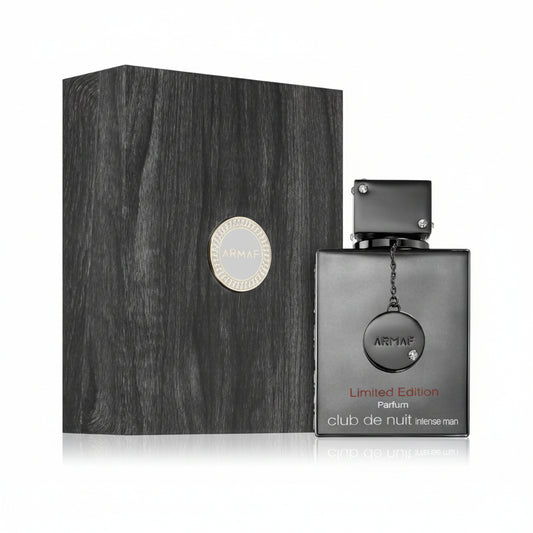 A boxed ARMAF Club de Nuit Limited Edition perfume bottle with a black cap and label, indicating luxury and exclusivity.