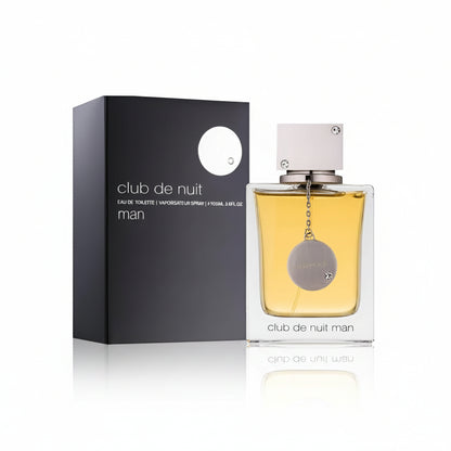 ARMAF Club De Nuit Man perfume bottle and packaging, with the brand name displayed on the box and the bottle containing a yellow liquid.