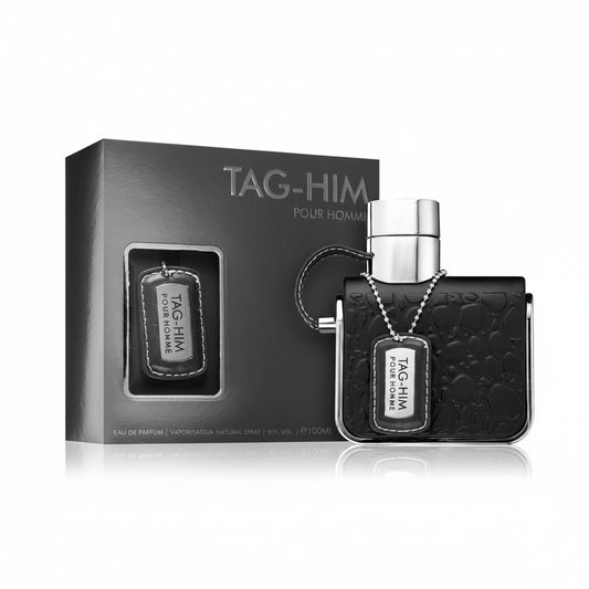 ARMAF TAG HIM perfume bottle with box and spray nozzle, predominantly black in color.